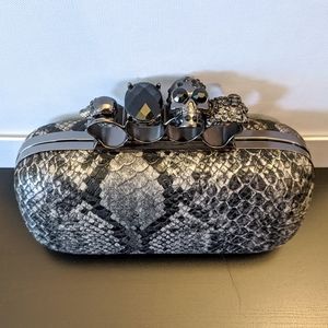 Four Ring Skull Clutch
